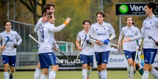 De heren van Tilburg vieren een doelpunt. Foto: Ruud Stork